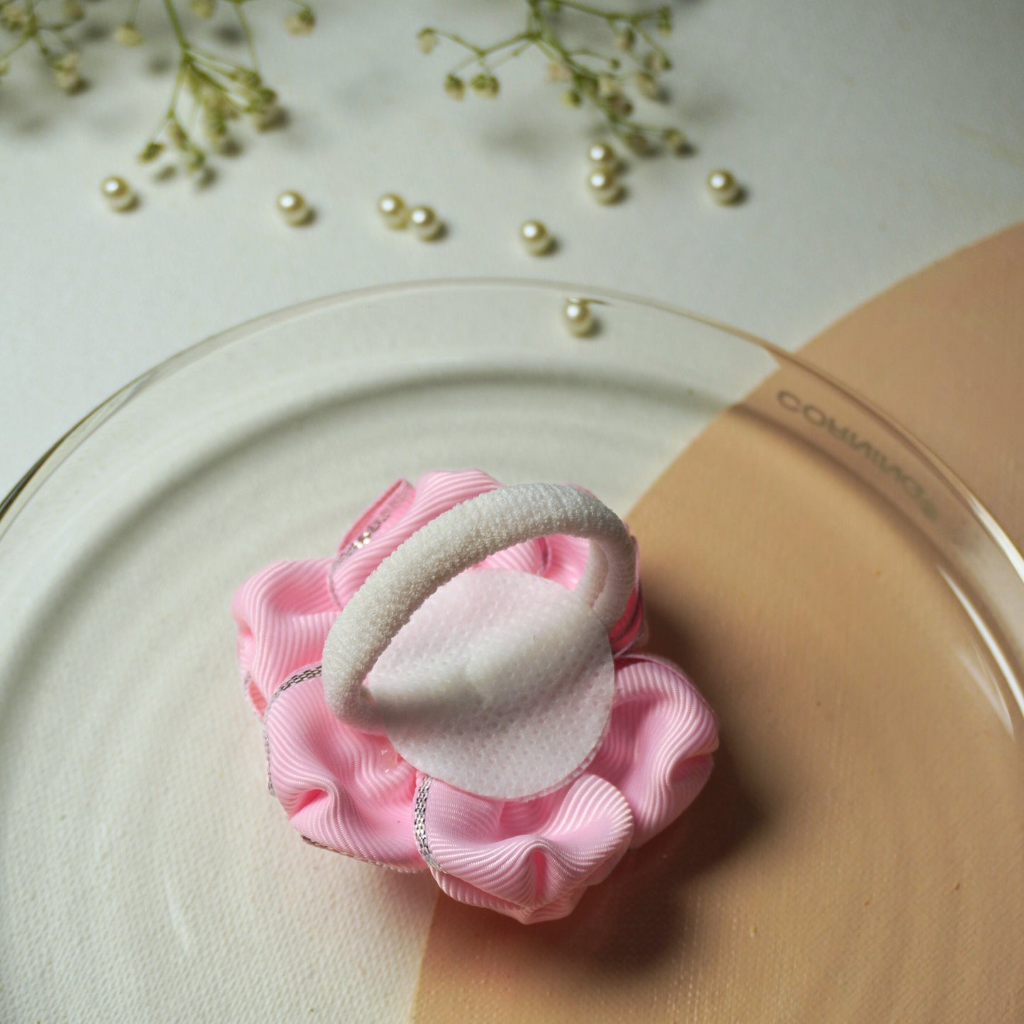 Pink flower hair tie with silver metallic accent for girls