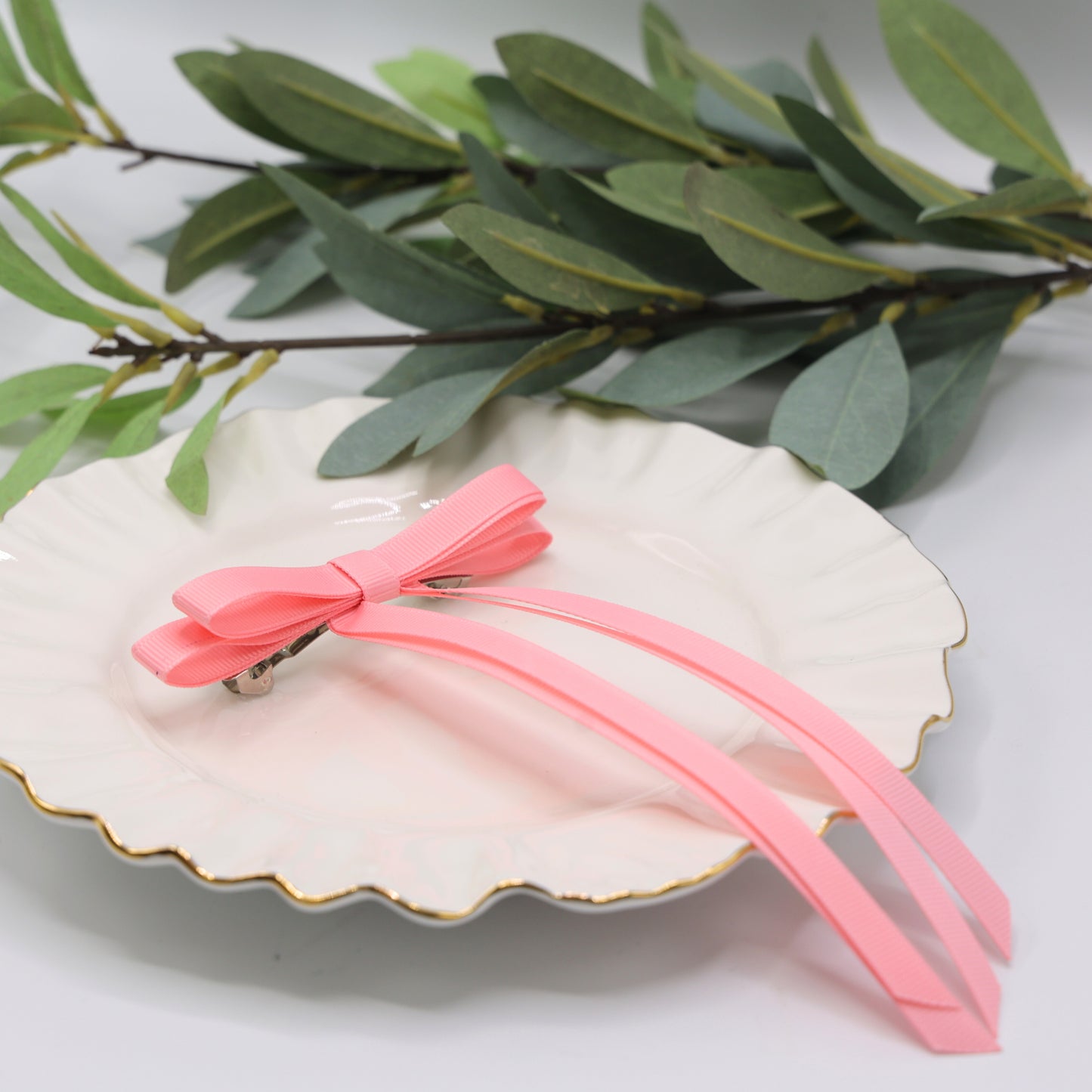 Close-up of Tesral Ethereal Pearl Pink Hair Bow, highlighting fine ribbed texture of grosgrain ribbon and construction.
