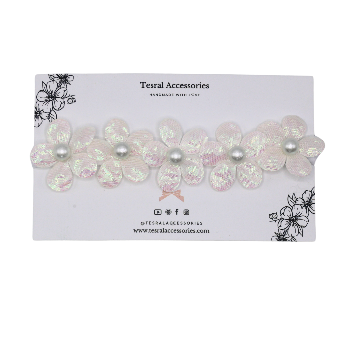 Close-up of Fairy Frost’s iridescent petals and soft elastic band for newborn comfort