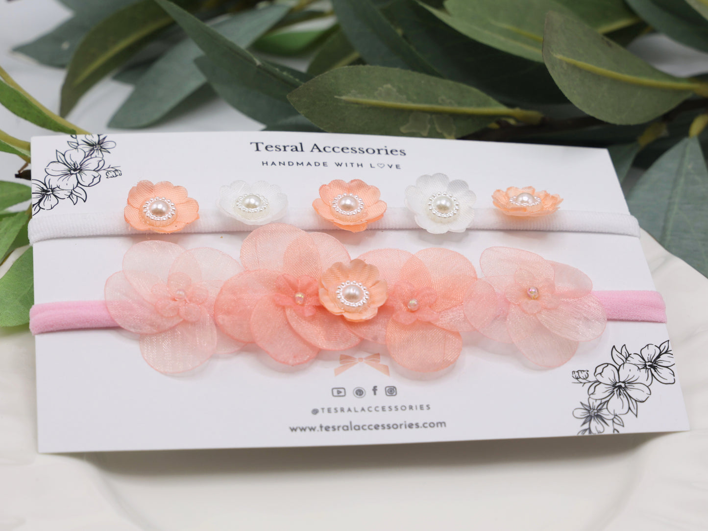 Detail of sheer floral rows and alternating pink-white blossoms on Tiara Bloom headbands