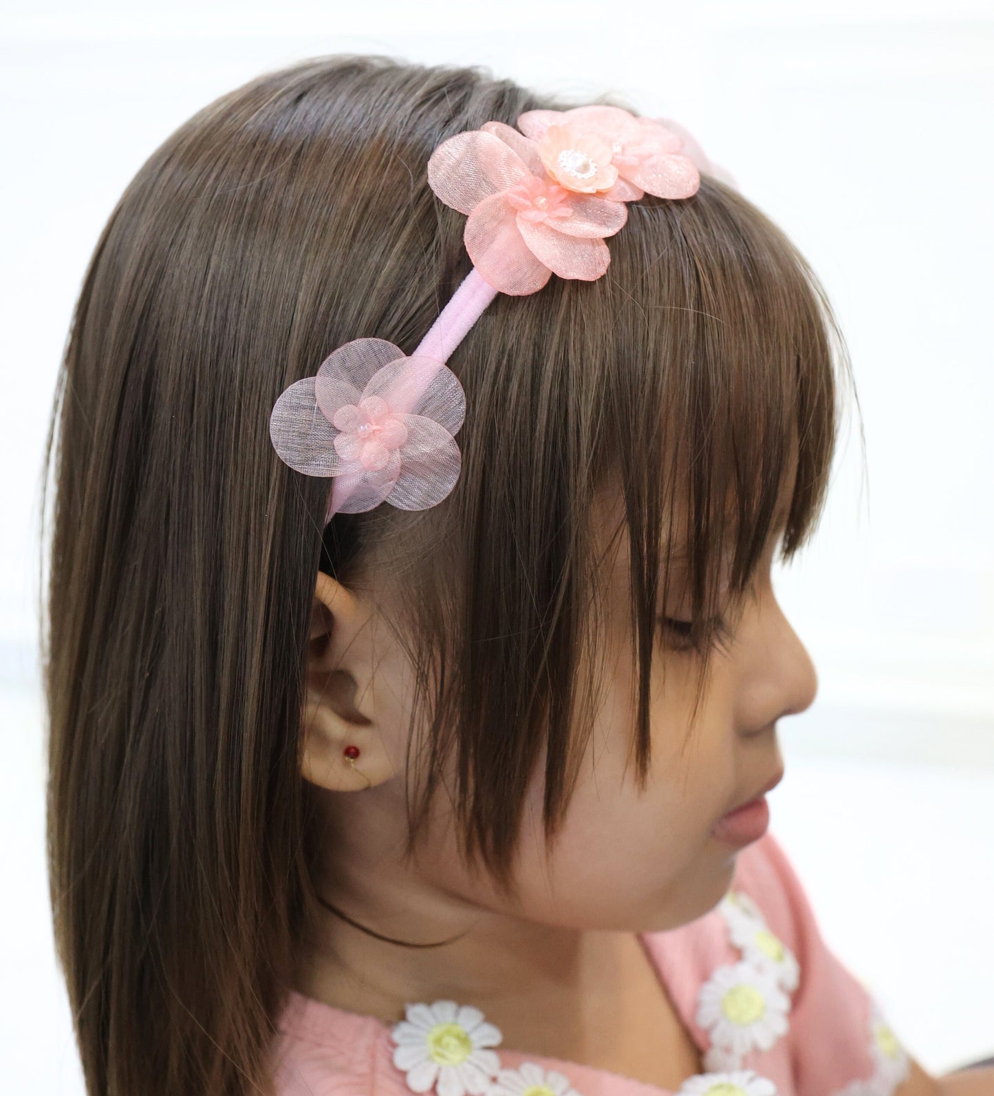 Little girl wearing Tiara Bloom Pink set – soft and elegant headbands by Tesral Accessories