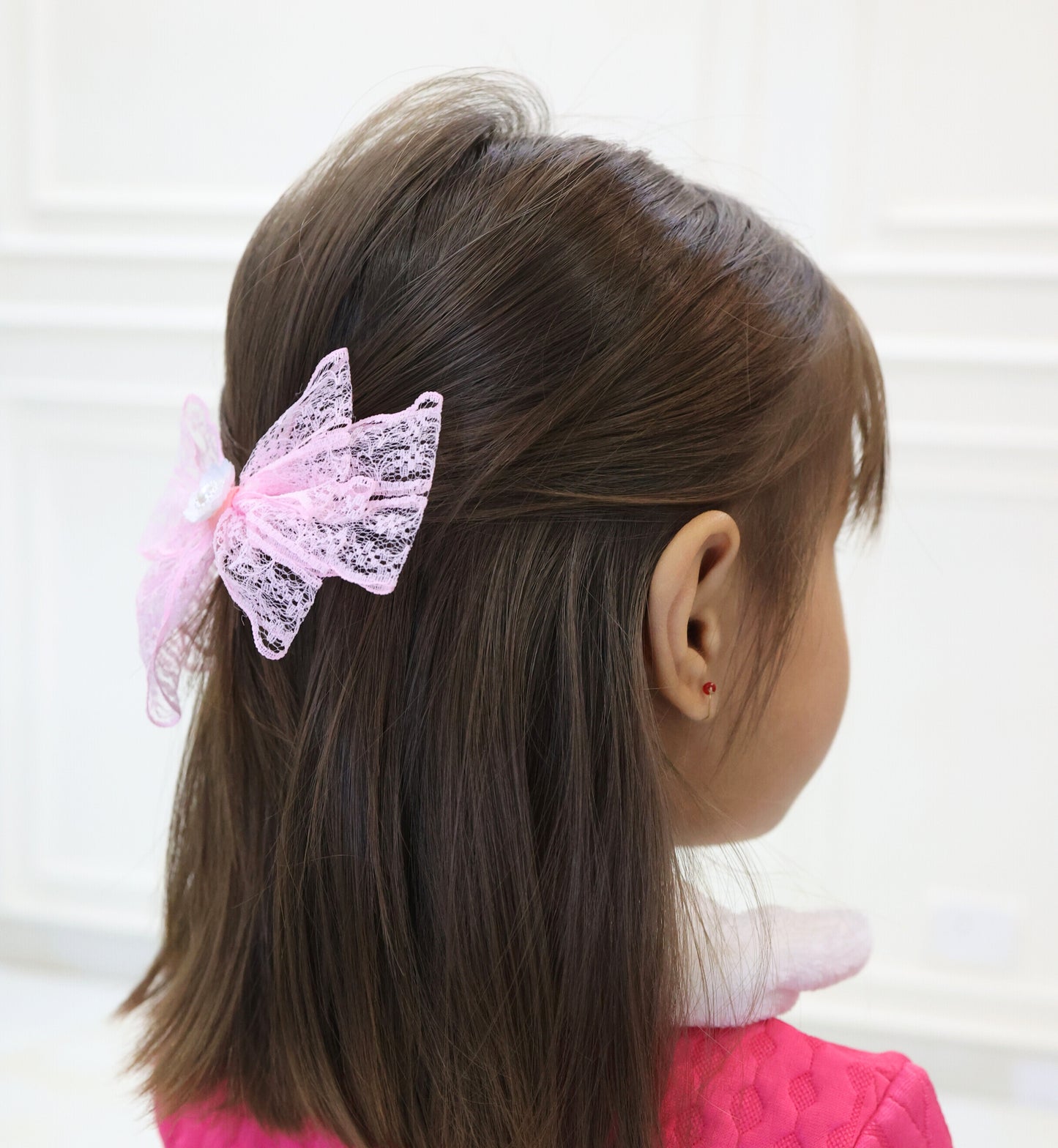 Girl wearing Lace Lullaby soft pink lace hair bow – perfect for daily elegance by Tesral Accessories