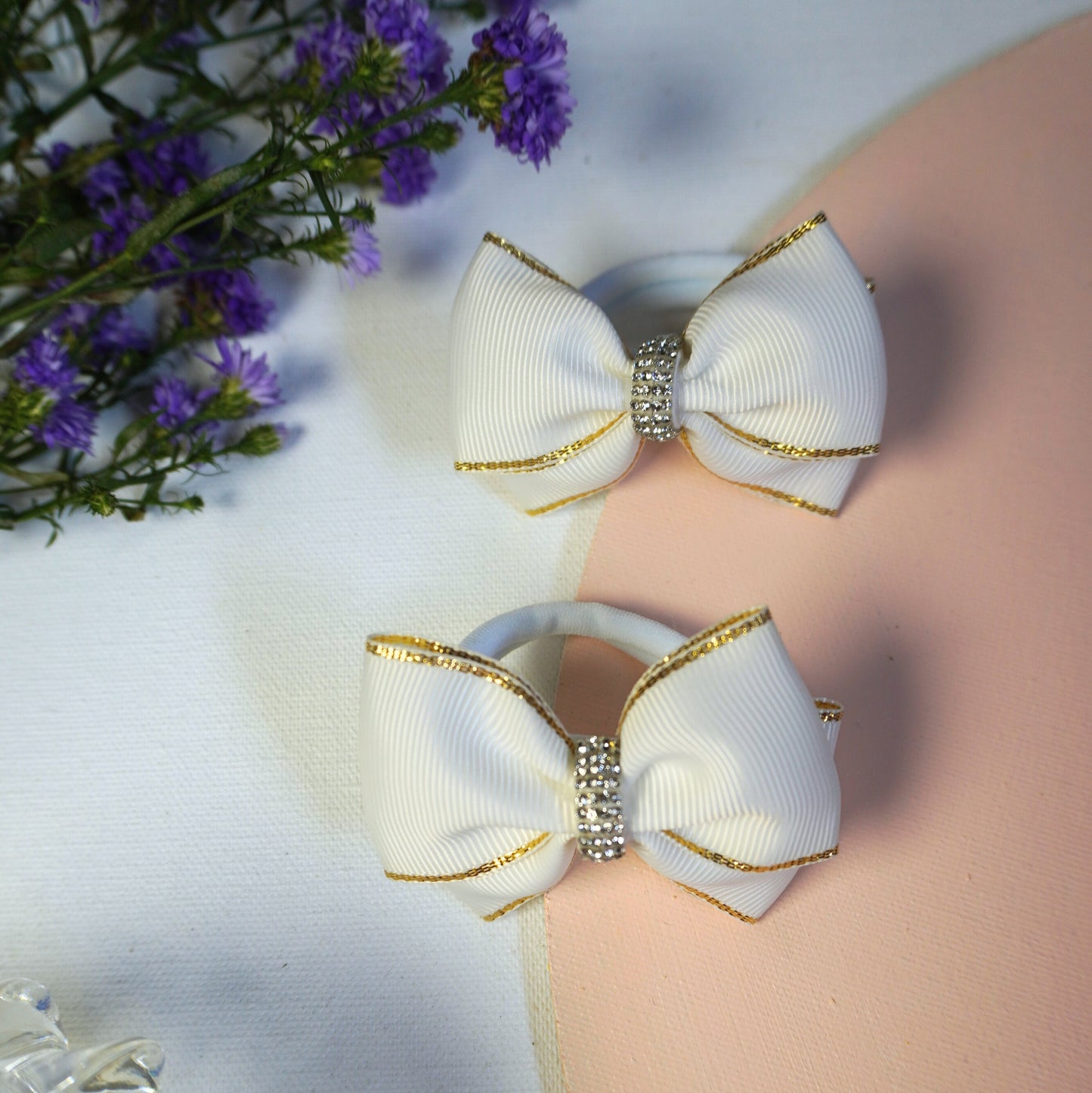 Elegant white grosgrain ribbon hair ties with rhinestone sparkle for toddlers and little girls