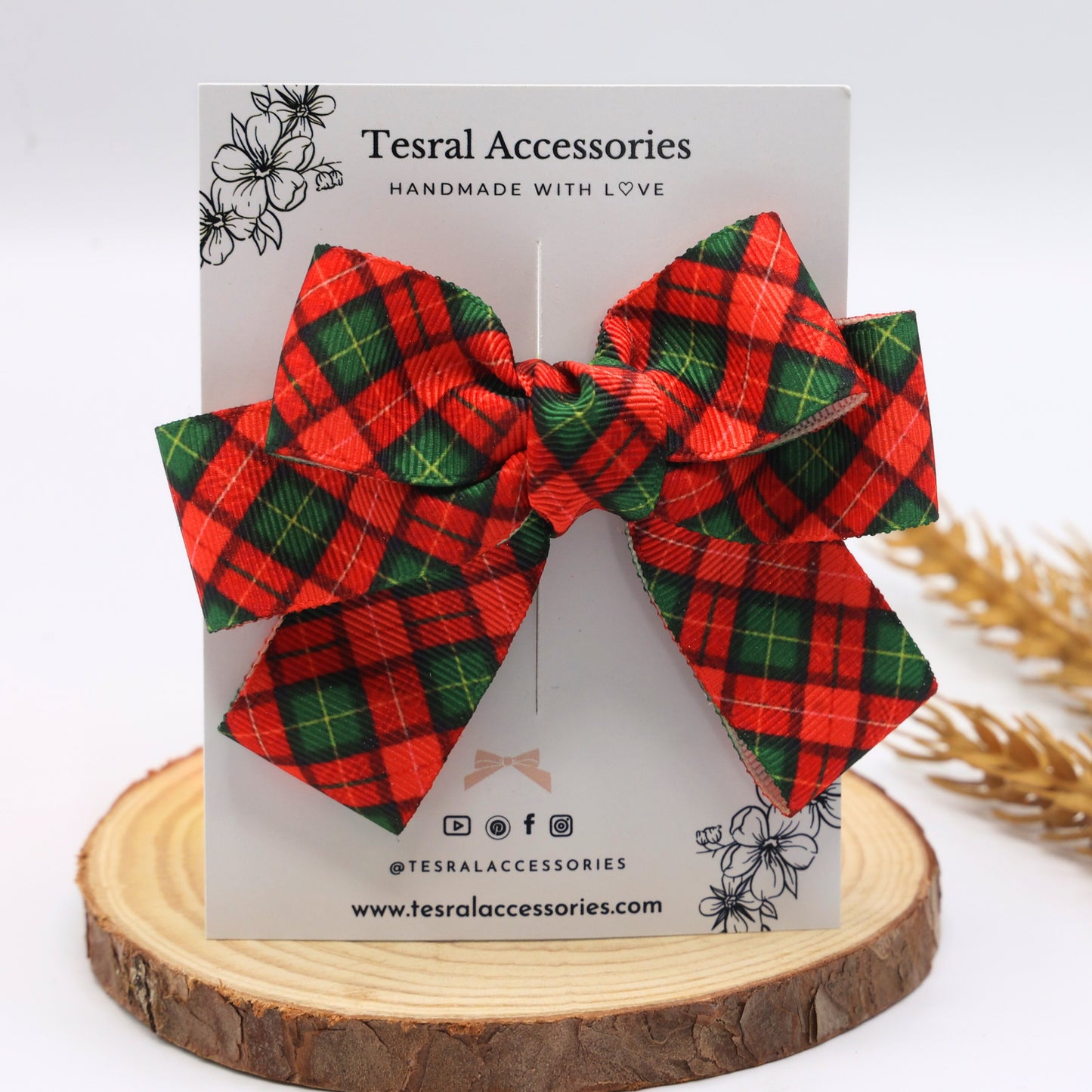 Red and green plaid hair bow for kids on Tesral Accessories display card – SugarPlaid bow handmade with love
