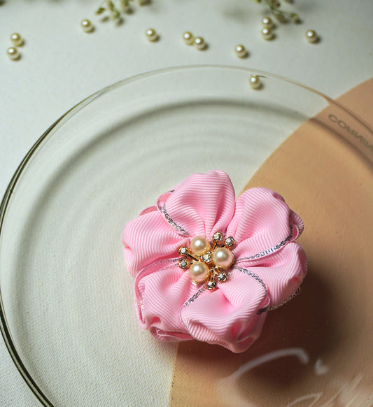 Single pink silk ribbon flower hair tie with pearl and rhinestone center