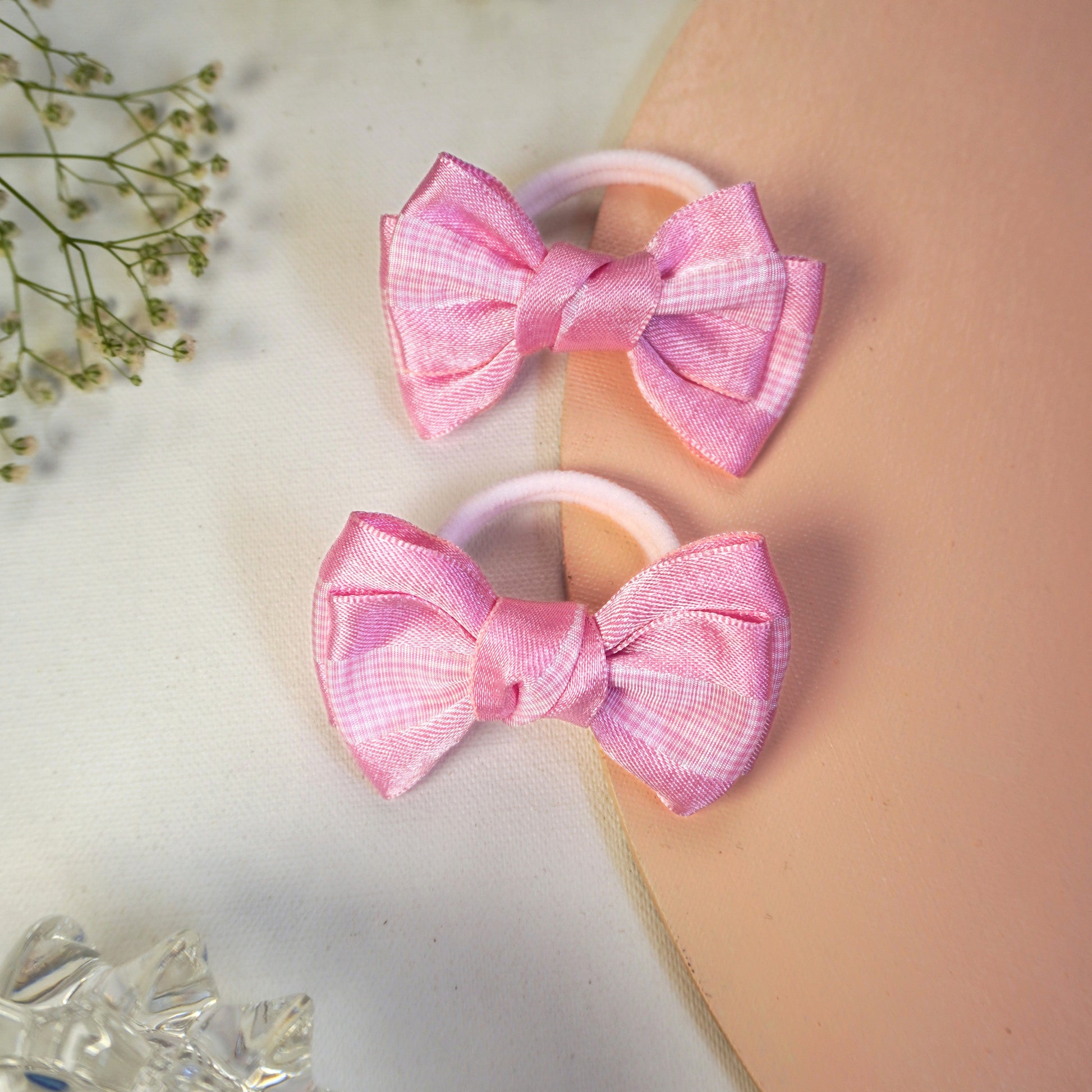 Pink gingham satin bow hair tie duo on elastic band for toddlers and little girls