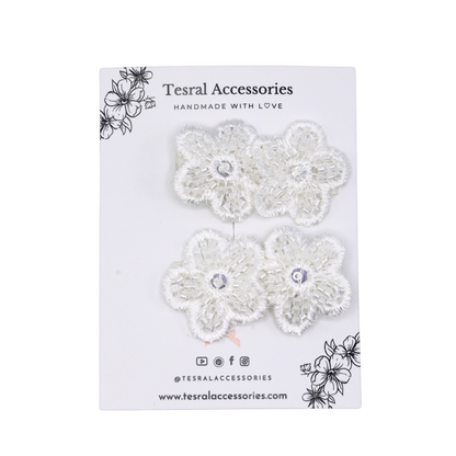  Tesral Embellished Bloom Hair Clips set - pair of white floral appliqués with beads and sequins on alligator clips, ideal for special occasions.