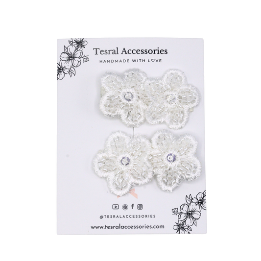 Tesral Embellished Bloom Hair Clips set - pair of white floral appliqués with beads and sequins on alligator clips, ideal for special occasions.