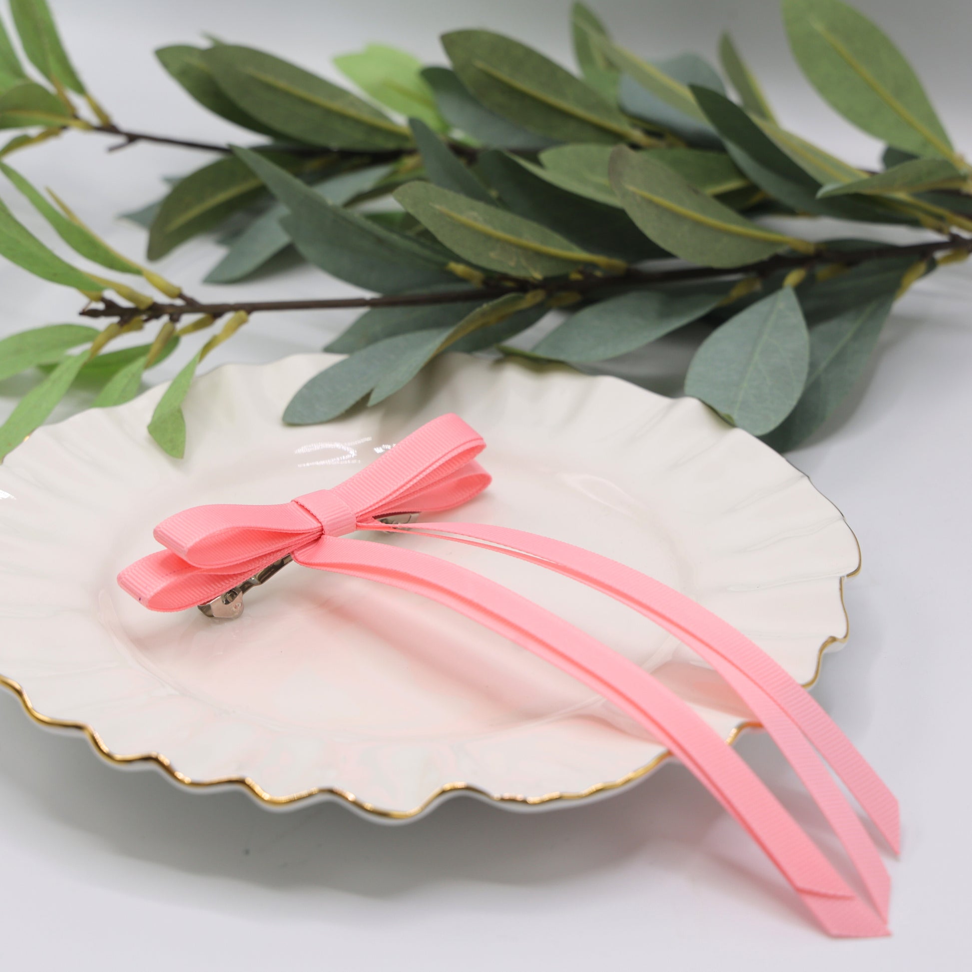 Close-up of Tesral Ethereal Pearl Pink Hair Bow, highlighting fine ribbed texture of grosgrain ribbon and construction.