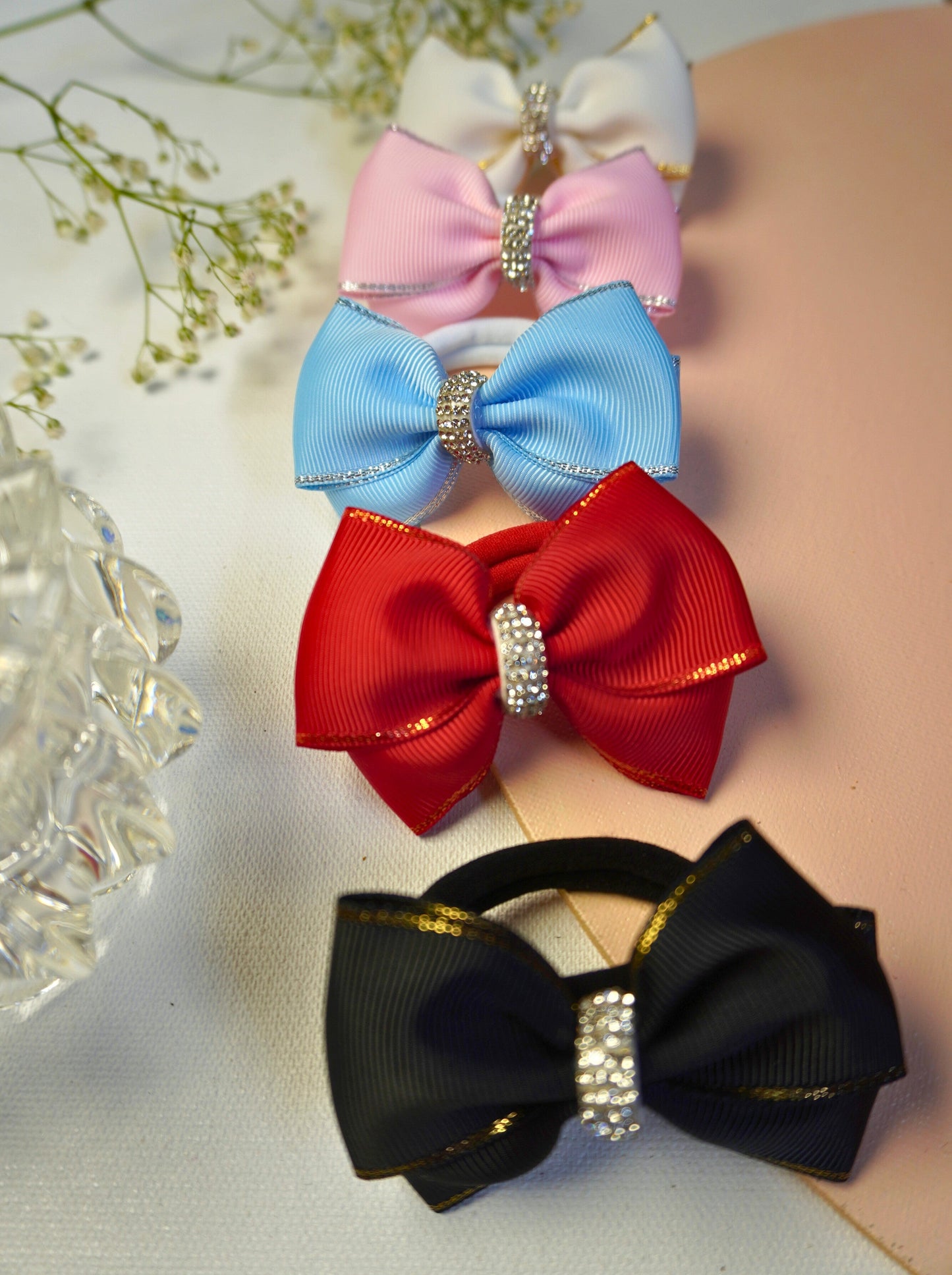 Close-up of assorted grosgrain bow hair ties showing rhinestone center and metallic edge – Tesral Accessories