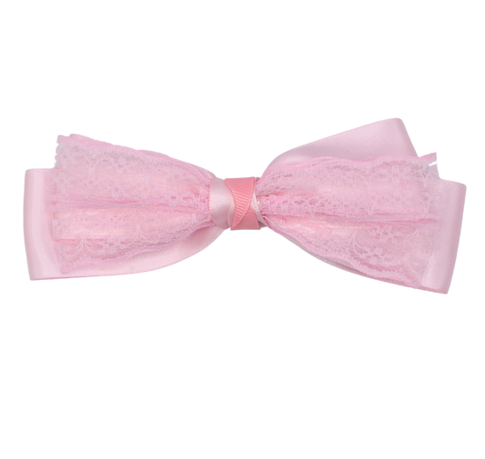 A pearl pink hair bow with a satin ribbon and lace detailing.