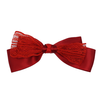 A red hair bow with double-sided satin layers and sheer red lace detail, secured with a French barrette.