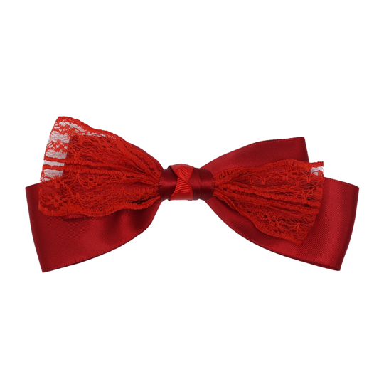 A red hair bow with double-sided satin layers and sheer red lace detail, secured with a French barrette.