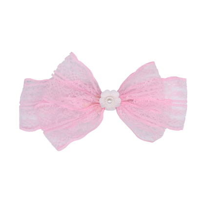 Close-up of Lace Lullaby's soft lace texture and central pearl floral detail – elegant styling hair bow by Tesral