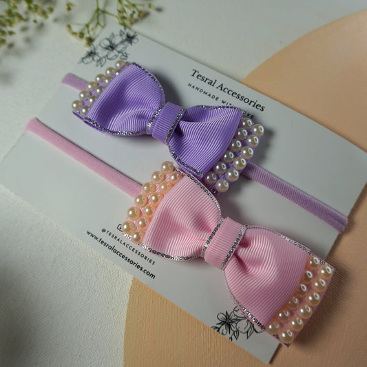"Set of two lavender and pink silk bow baby headbands with heavy pearl trim