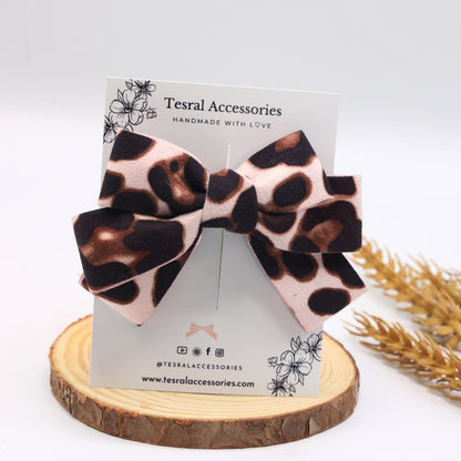 Tesral Leopard Luxe Hair Bow, bold velvet suede bow with rich leopard print, perfect for fashion-forward kids and adults.