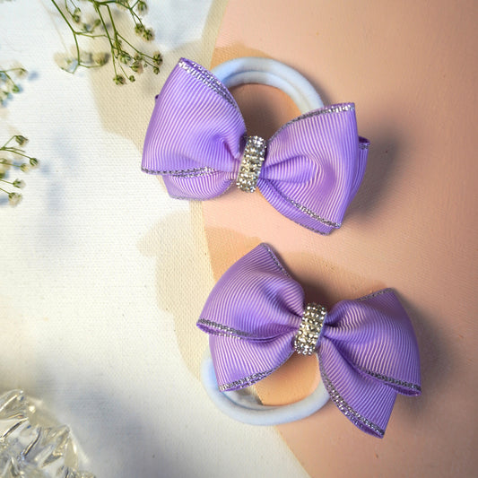 Elegant lilac bow hair ties for girls and toddlers with shimmering silver trim and rhinestone detail – pair by Tesral Accessories