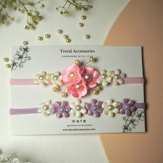 Set of two baby headbands with mermaid shimmer purple, pink, and white flower appliques