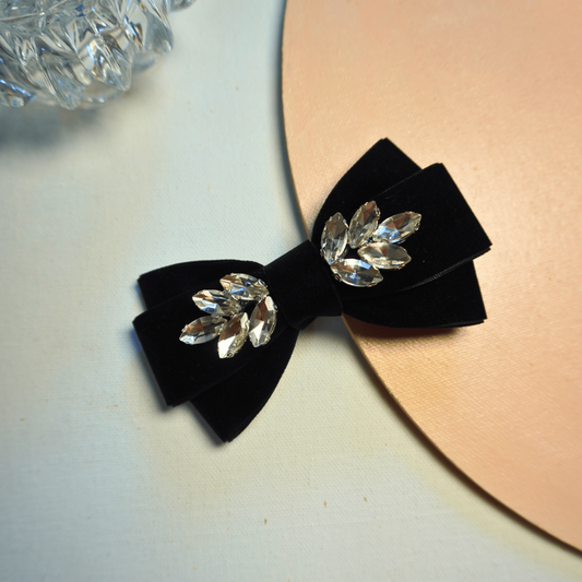 Black velvet hair bow with leaf rhinestone embellishment, luxury party hair accessory from Tesral Midnight Glimmer Collection