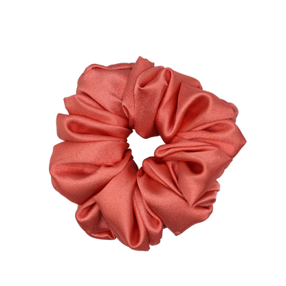 Tesral Peach Whirl Satin Scrunchie for women, medium-sized in soft peach tone, perfect for everyday wear.