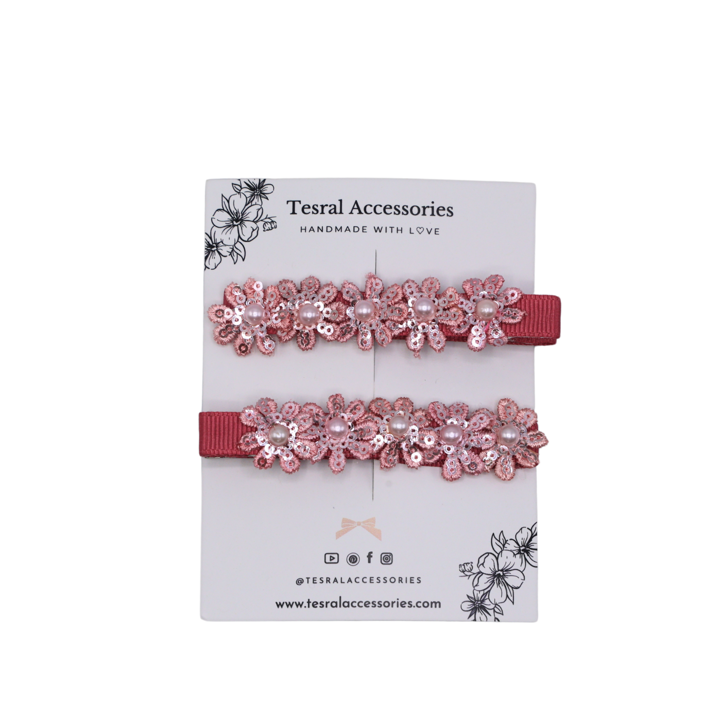 Detailed view of Petal Bloom Clip showing glittering floral embellishment on grosgrain base.