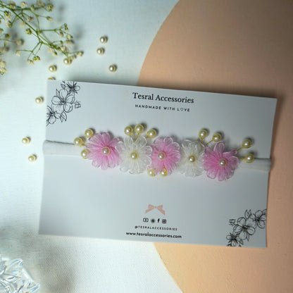 Single pink and white delicate fabric flower headband with pearl details for baby
