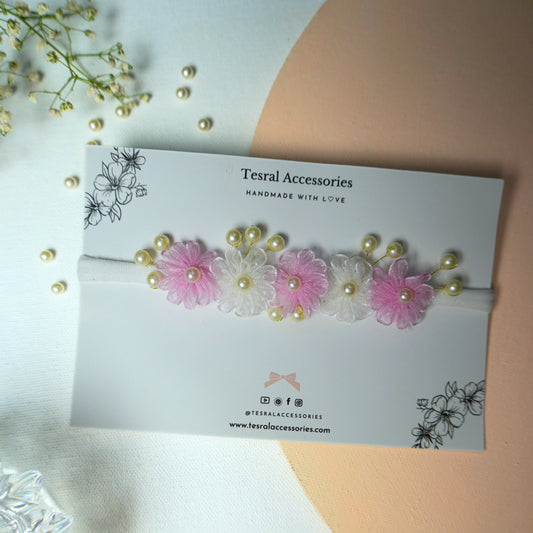 Single pink and white delicate fabric flower headband with pearl details for baby