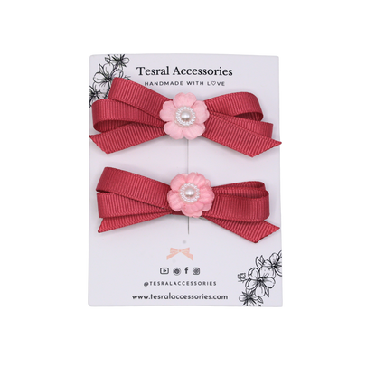 Colonial pink grosgrain ribbon twin bows with flower centerpiece —cute toddler hair accessories.