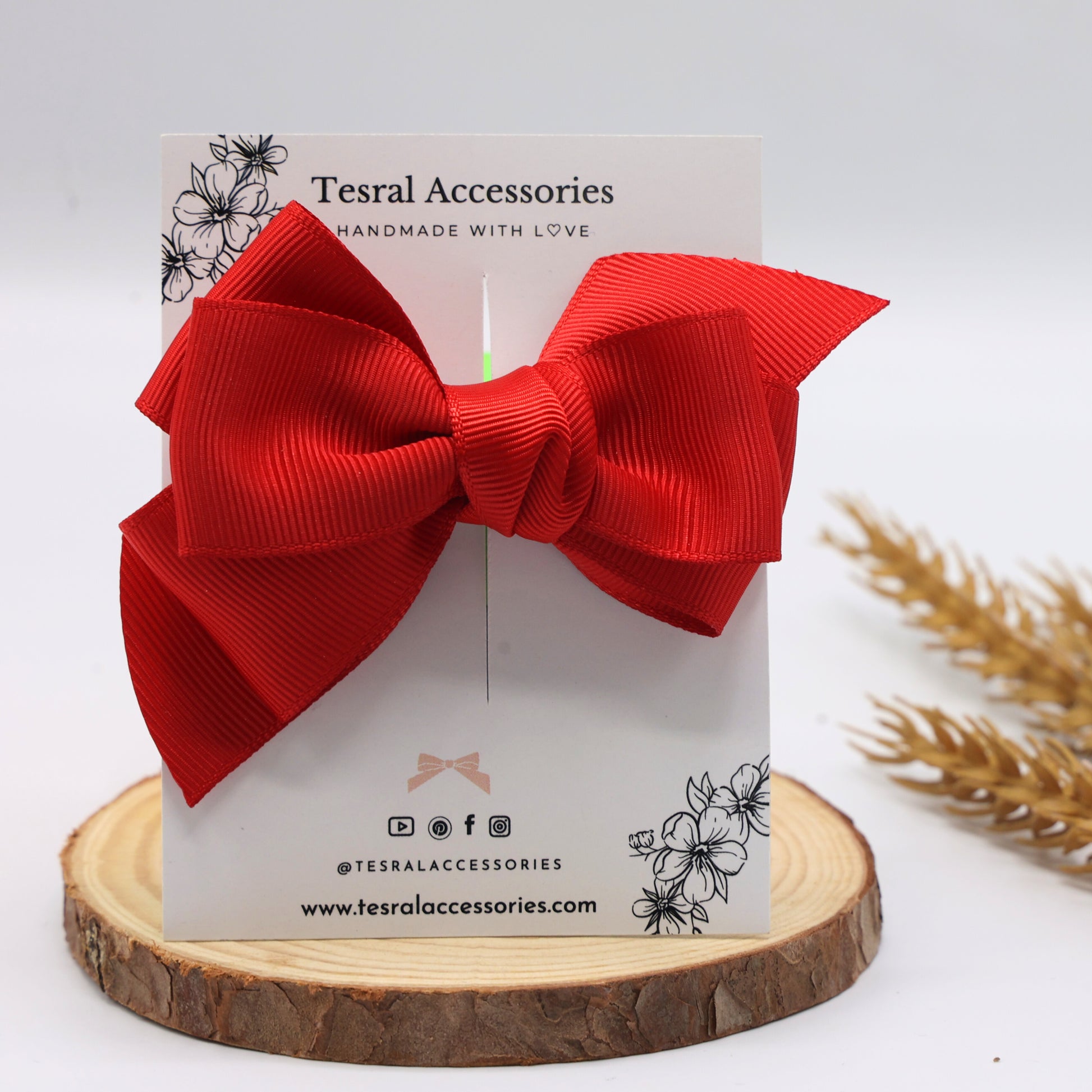 Red Spin Hair Bow for kids by Tesral Accessories, spiral-style grosgrain ribbon bow in bold red on 4.5 cm alligator clip, ideal for festive and winter wear.