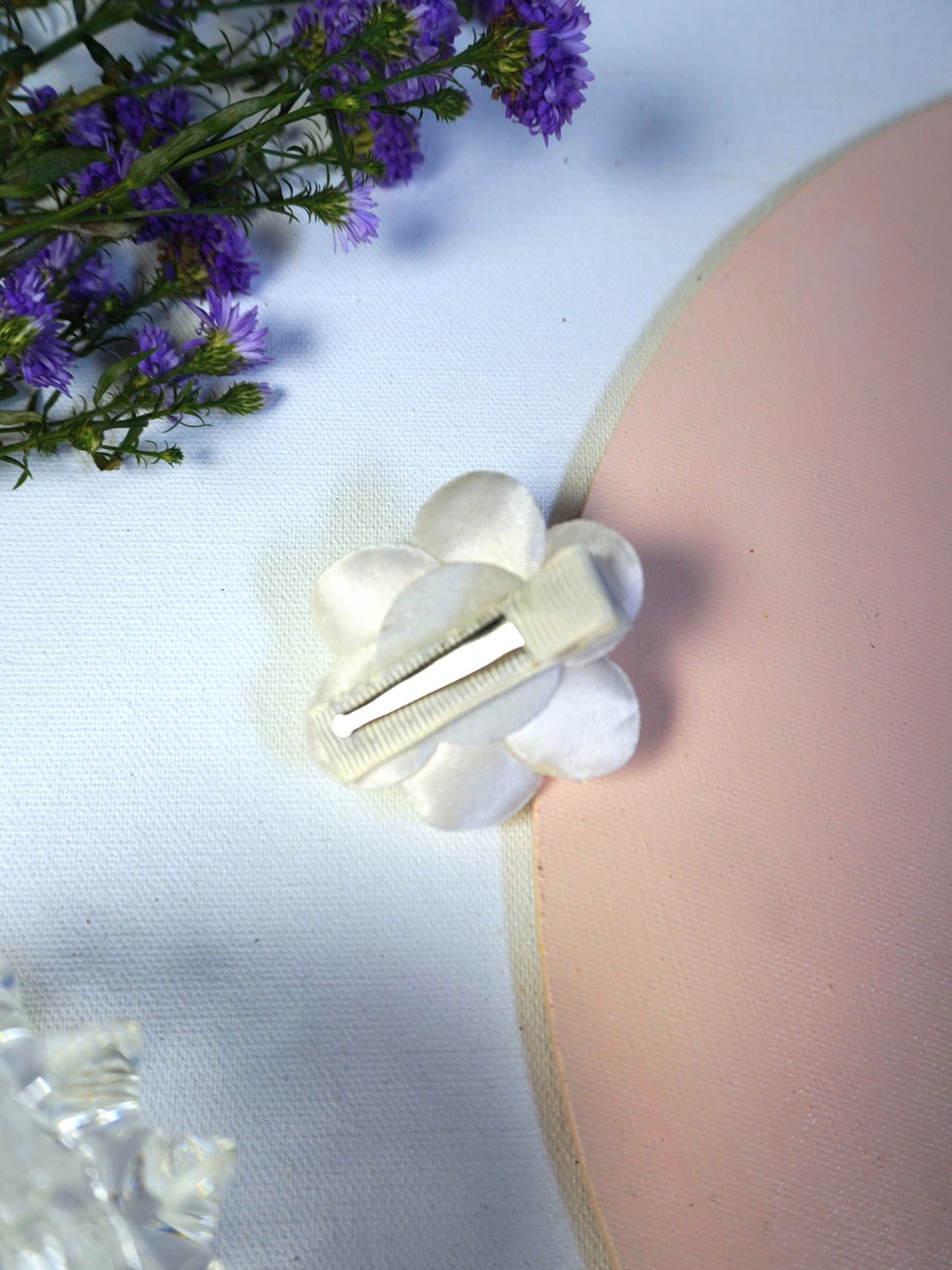 White Rosette Clip with iridescent flower design and silver alligator clasp, elegant multipurpose hair and fashion accessory for girls and women.