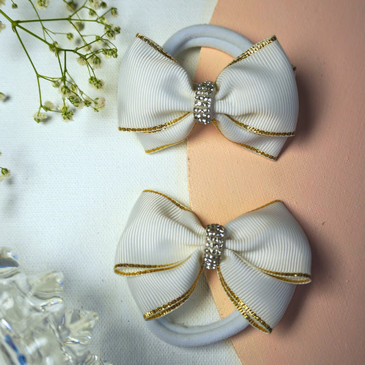 Set of two white grosgrain bow hair ties with golden edge and rhinestone centerpiece – Tesral Accessories