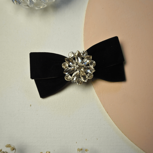 Velvet hair bow with rhinestone snowflake flower center, festive winter party accessory from Tesral Midnight Glimmer Collection