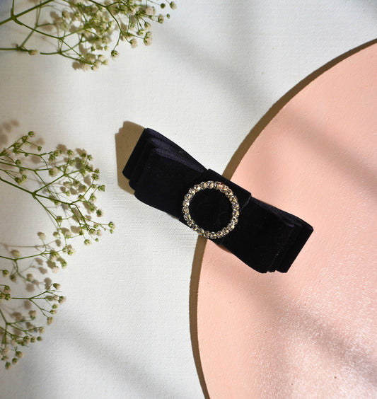A luxurious vintage-inspired black velvet triple hair bow with a round diamond centerpiece, named "The Empress." This elegant party accessory is perfect for Christmas and special occasions. 0
