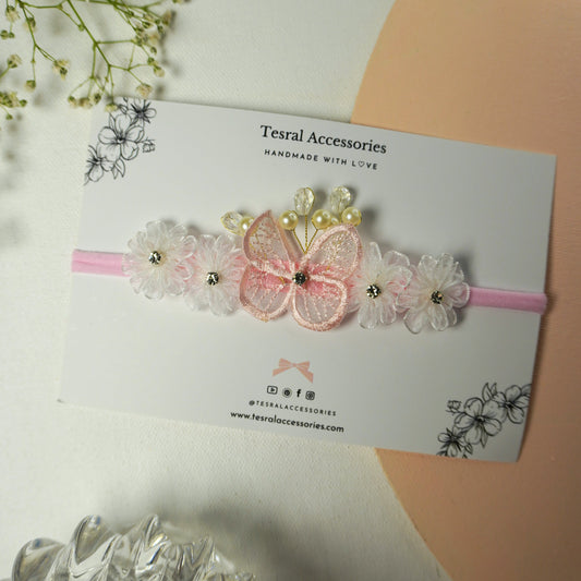 Handmade white organza flower headband with pink butterfly and pearl details